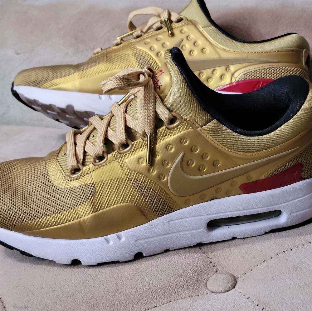 Gold Nike Zero sneakers